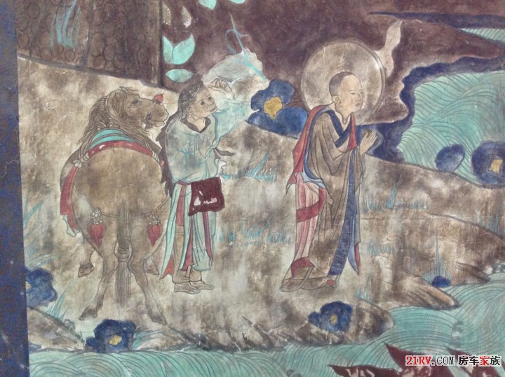 壁画，右边是唐僧，左边牵马者是孙悟空